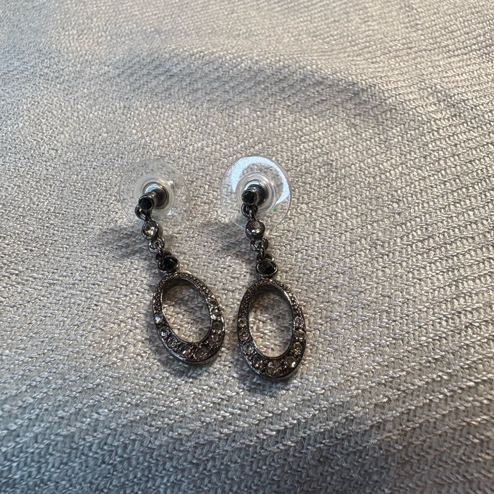Gunmetal, rhinestone and black rhinestone petite dangling post earrings.